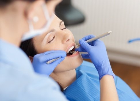 Dental patient receiving dentistry treatment under general anesthesia