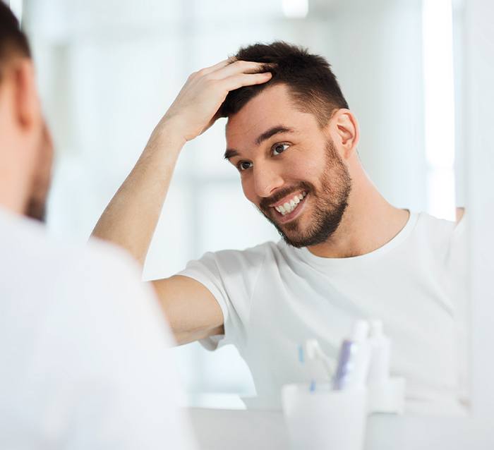 Patient in Anaheim smiling after teeth whitening